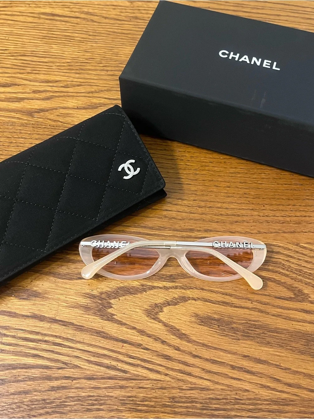 CHANEL Translucent Pale Pink Oval Sunglasses